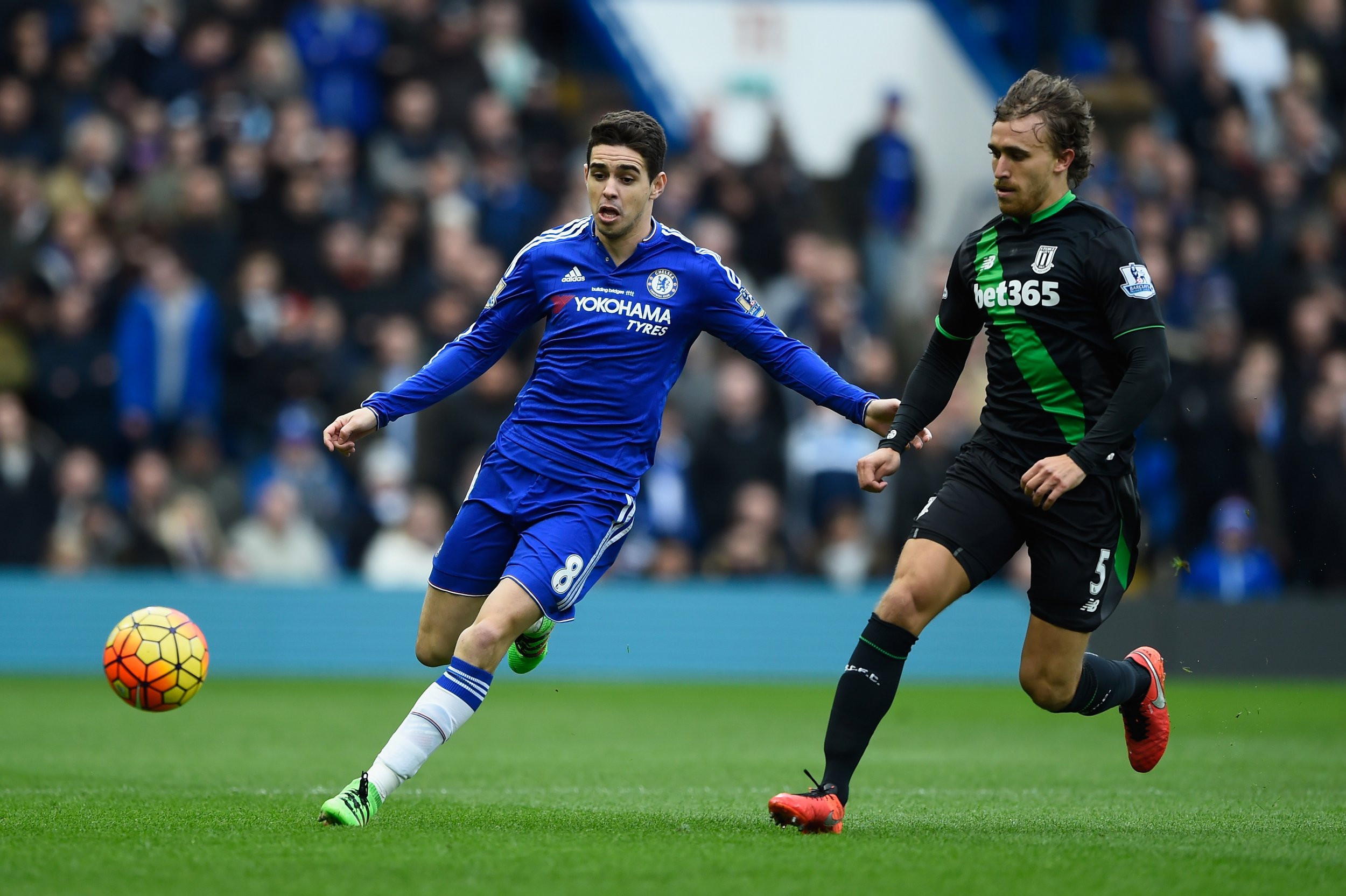 Chelsea midfielder Oscar, left.