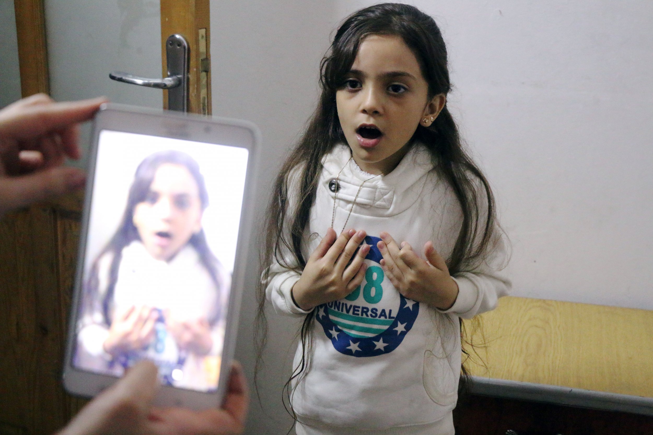 From Aleppos Bombs To Presidential Palace Seven Year Old Syrian Girl 