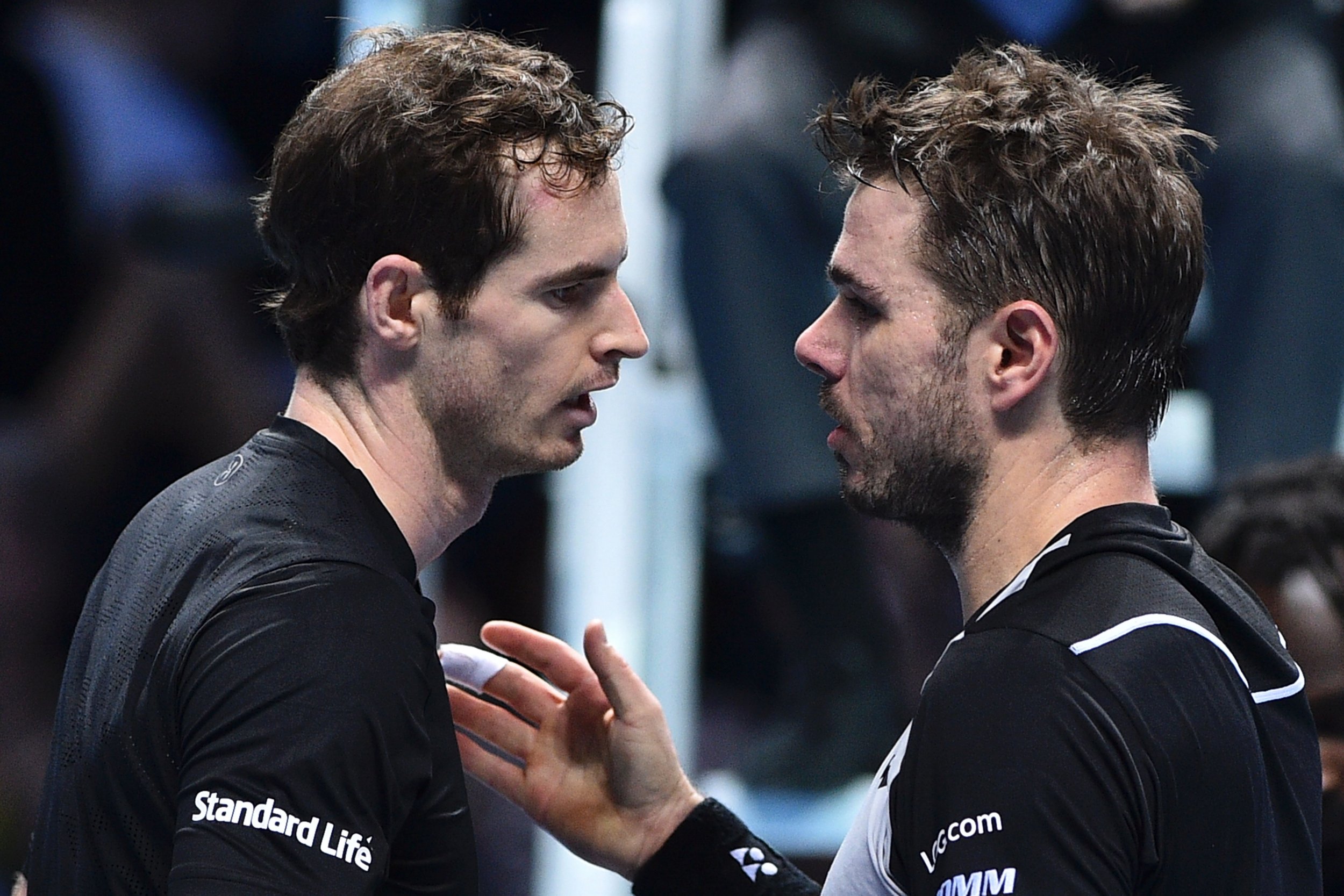 World number one Andy Murray, left, with rival Stan Wawrinka.