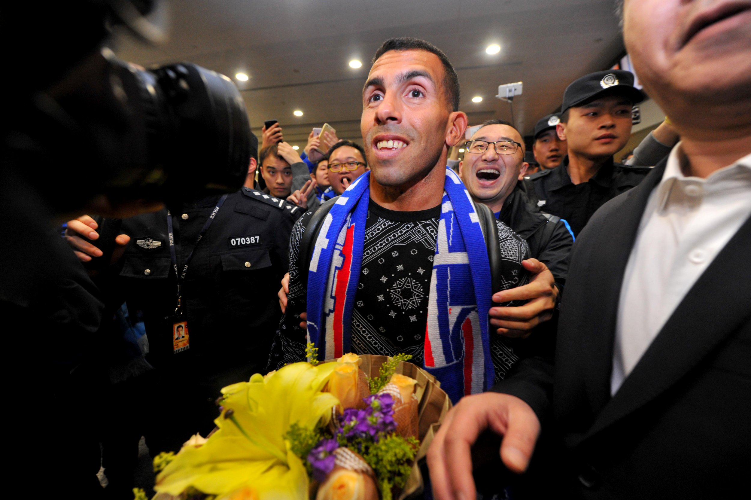 Argentine striker Carlos Tevez at Shanghai Pudong International Airport