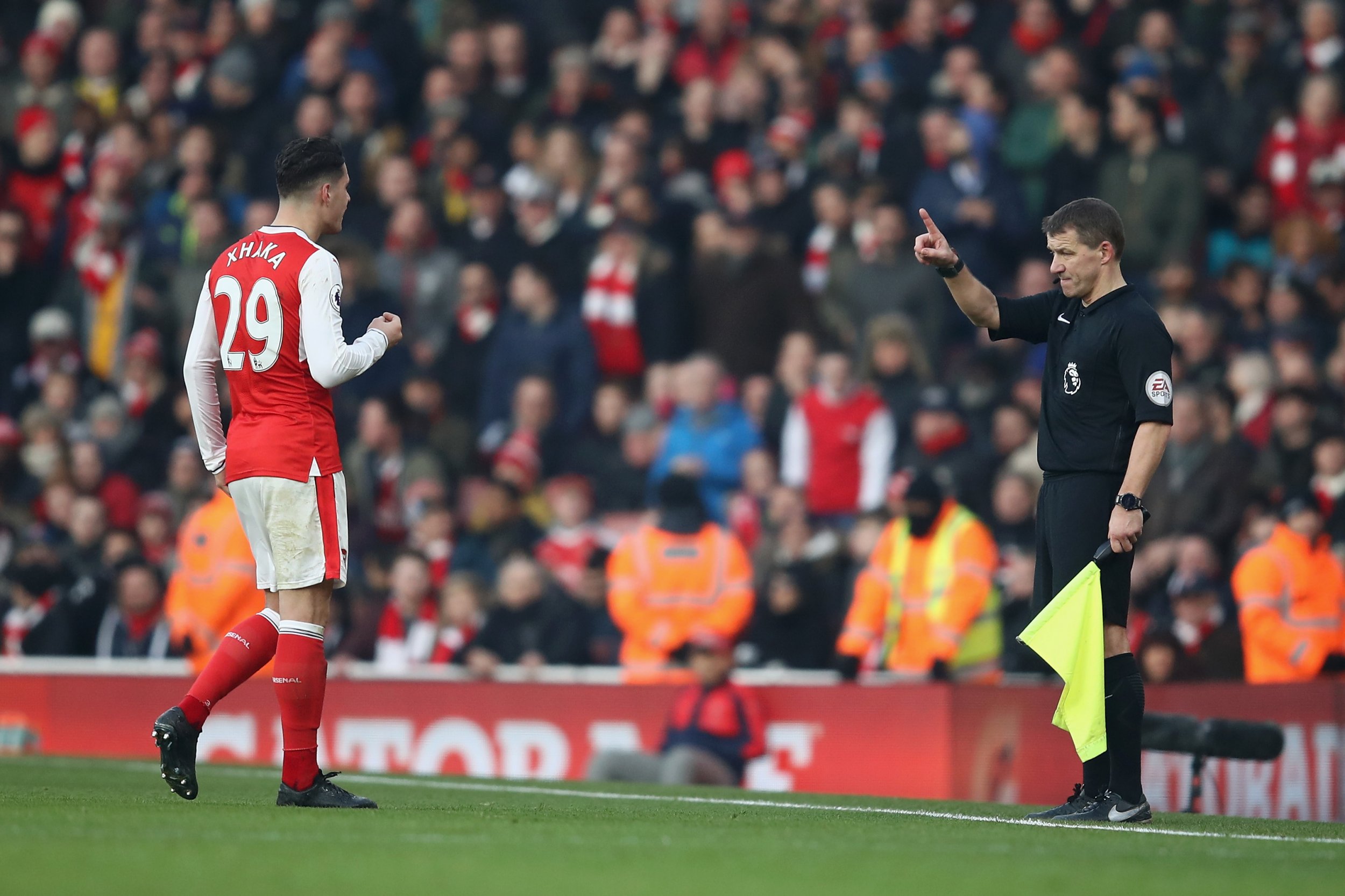 Arsenal midfielder Granit Xhaka, left.