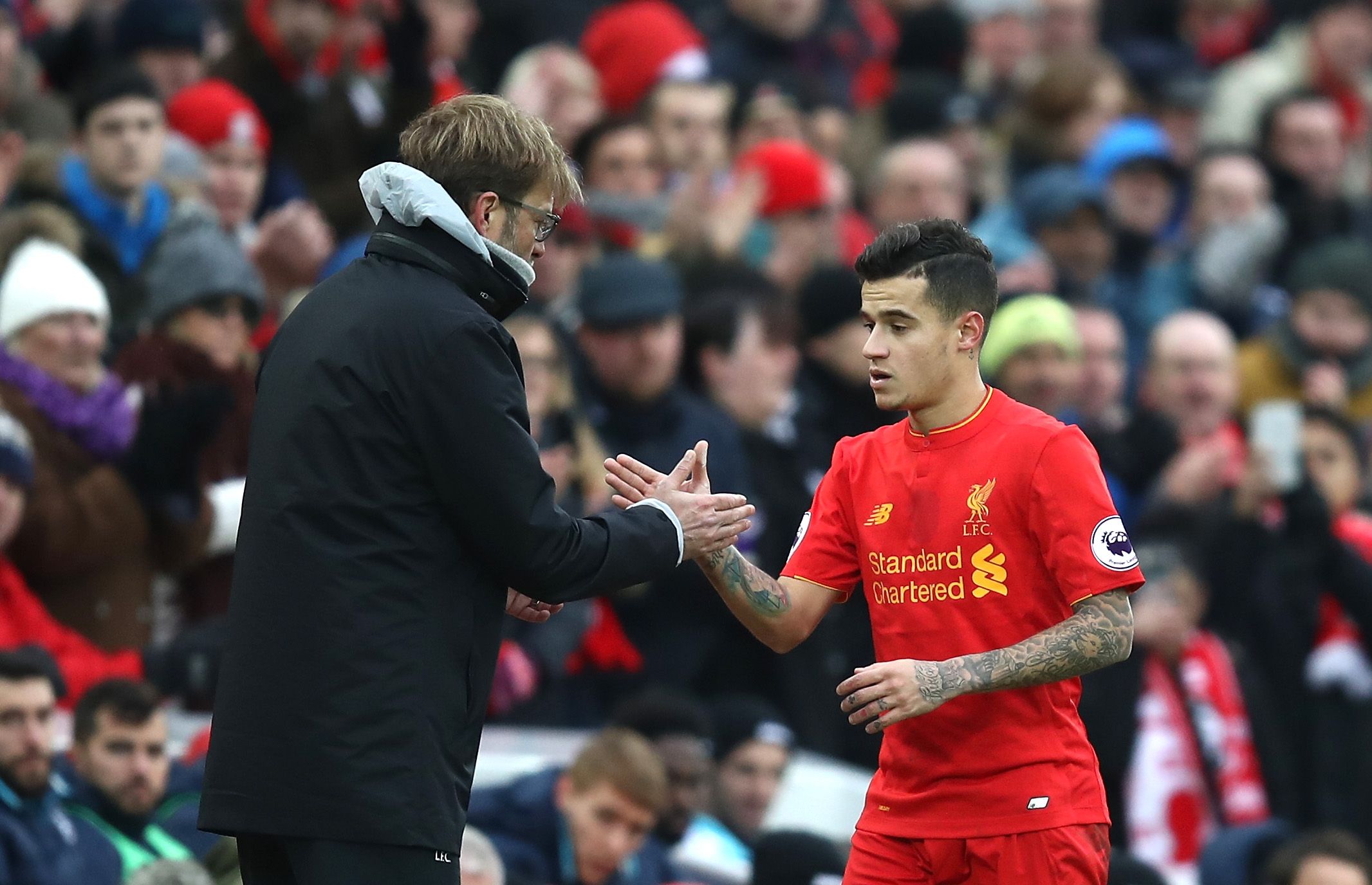 Liverpool manager Jurgen Klopp, left, with Philippe Coutinho.