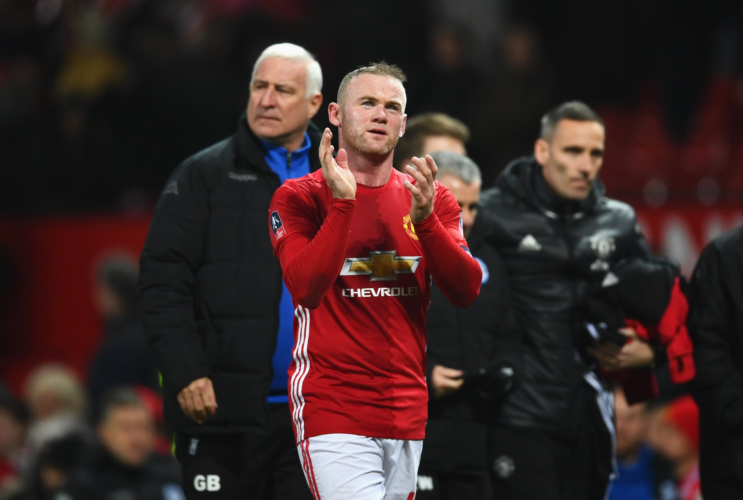 Manchester United striker Wayne Rooney, center.