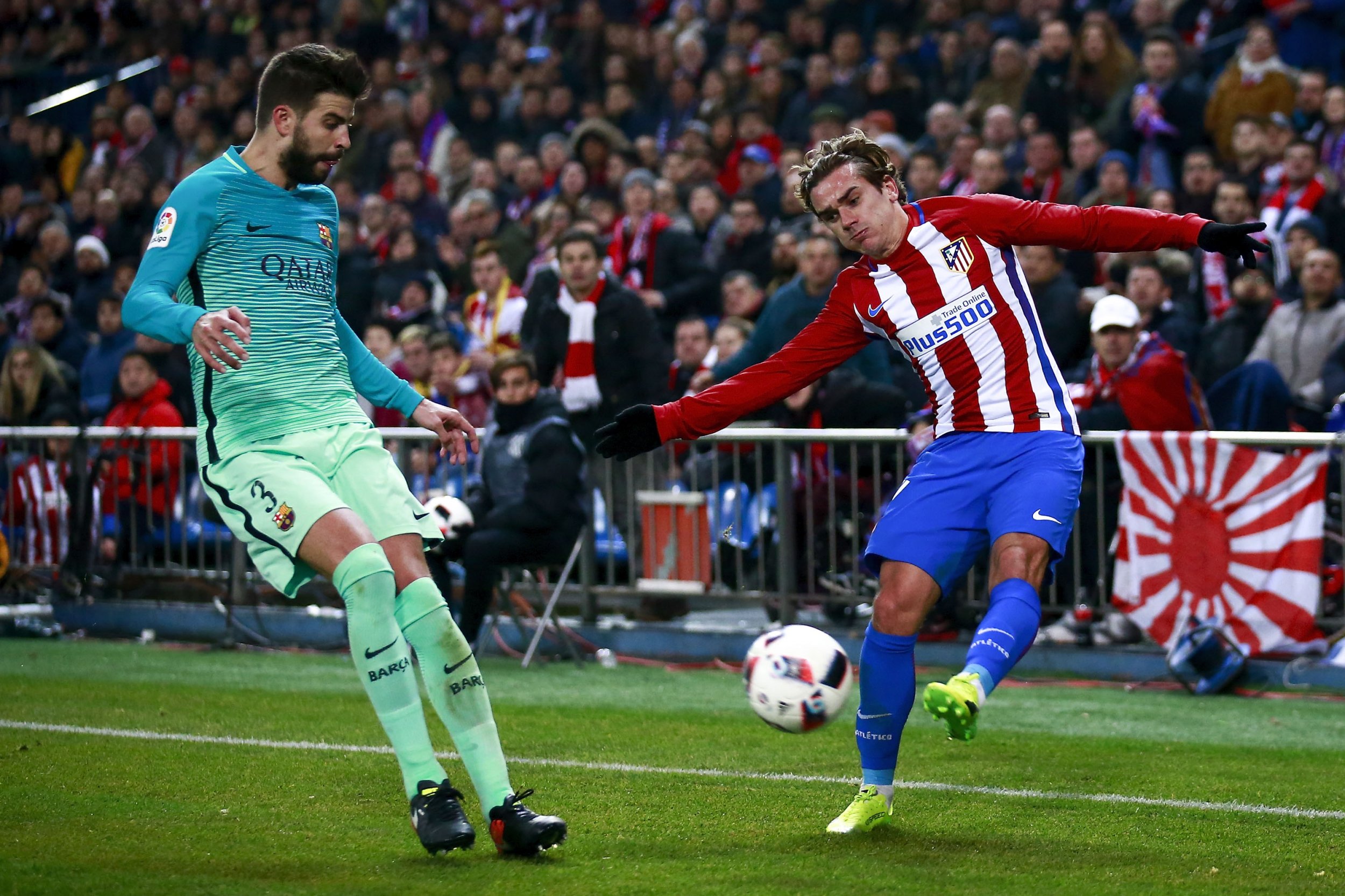 Atletico Madrid striker Antoine Griezmann, right.