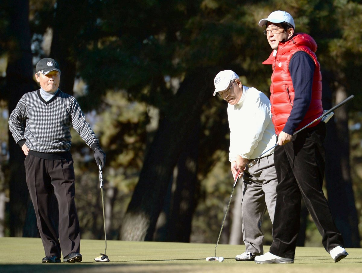 Abe plays golf