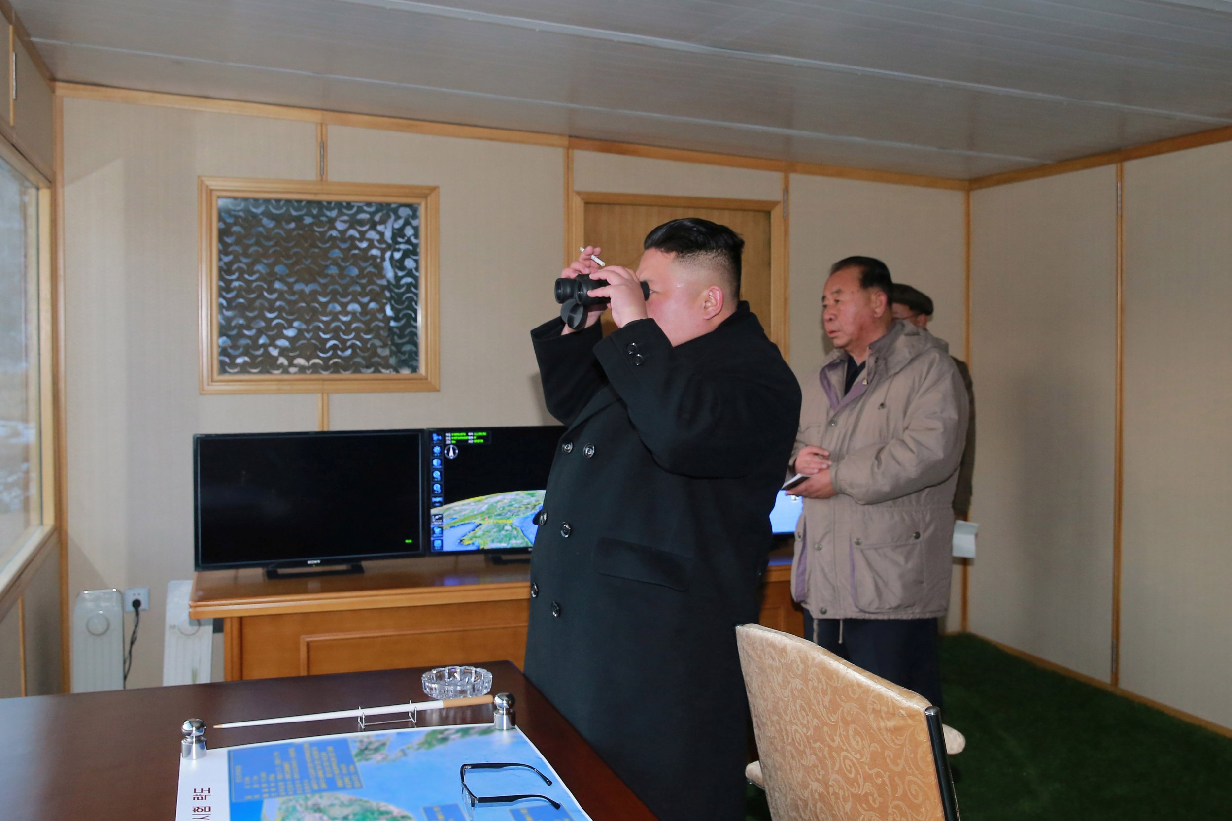 Kim Jong Un watches missile