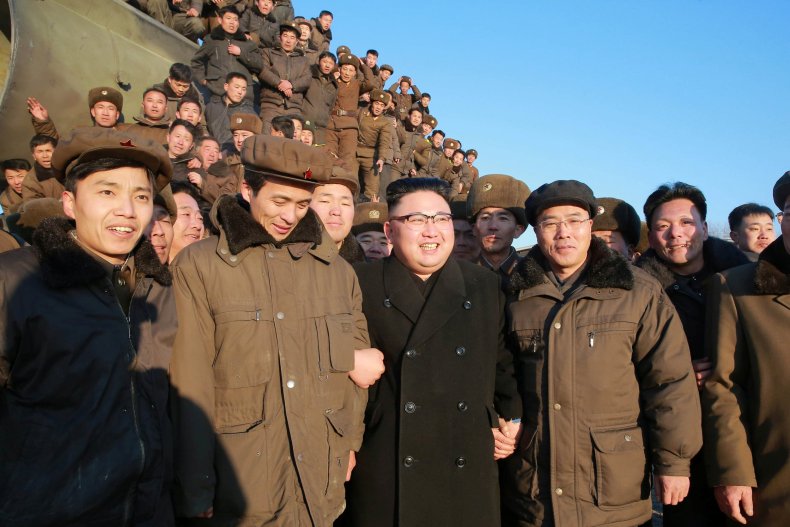 North Koreans watch launch