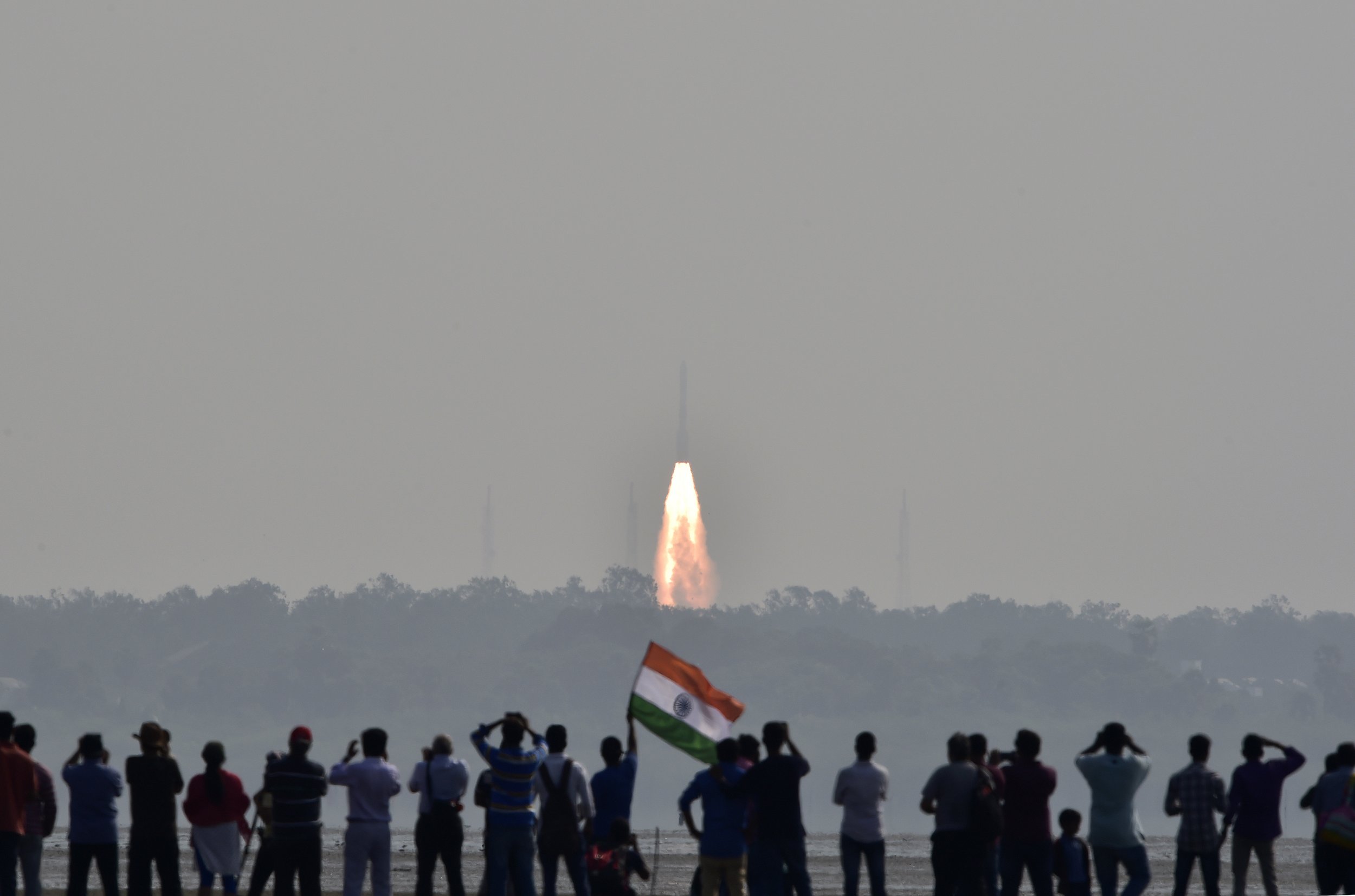 Indians watch satellite launch