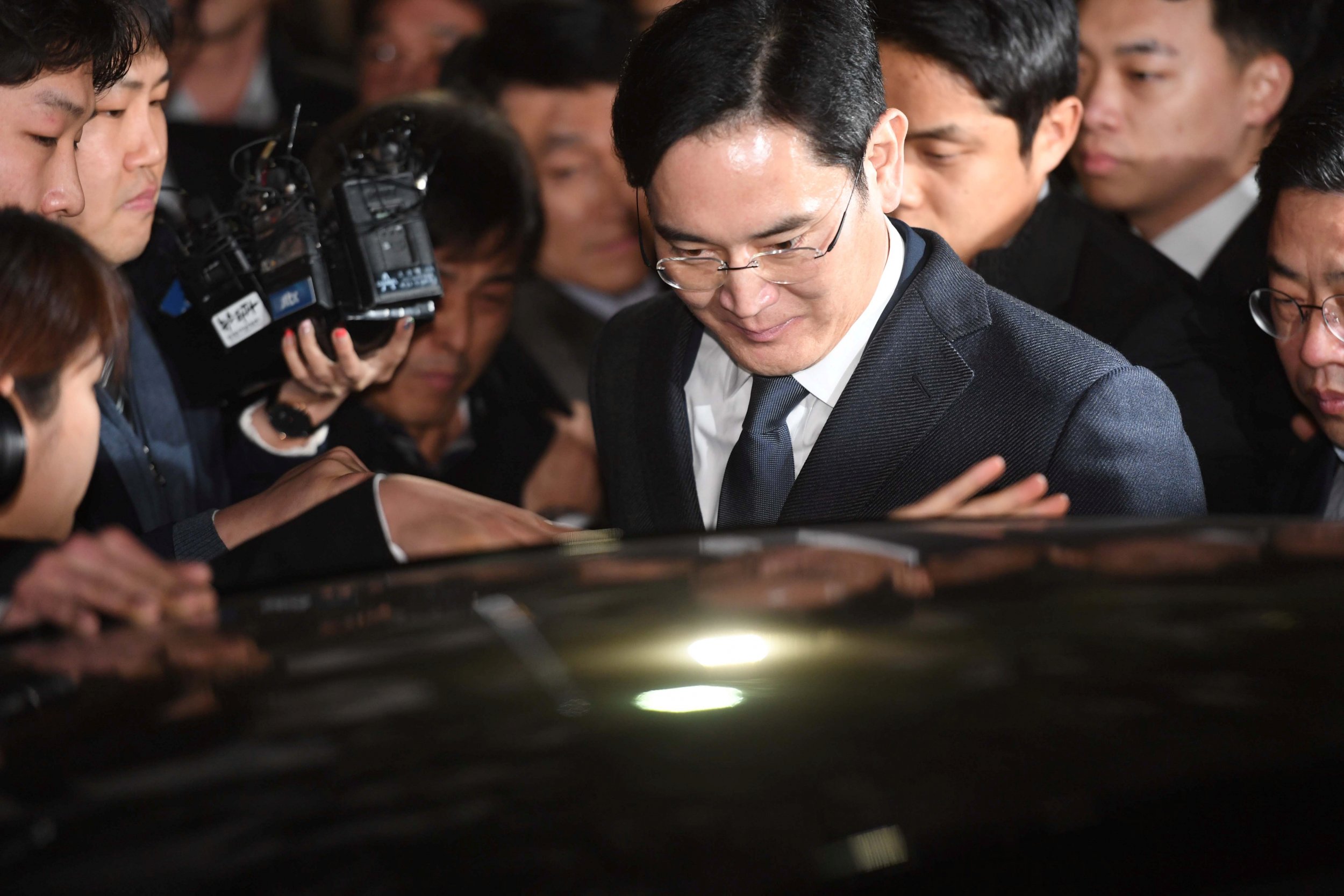 Samsung chief getting into car