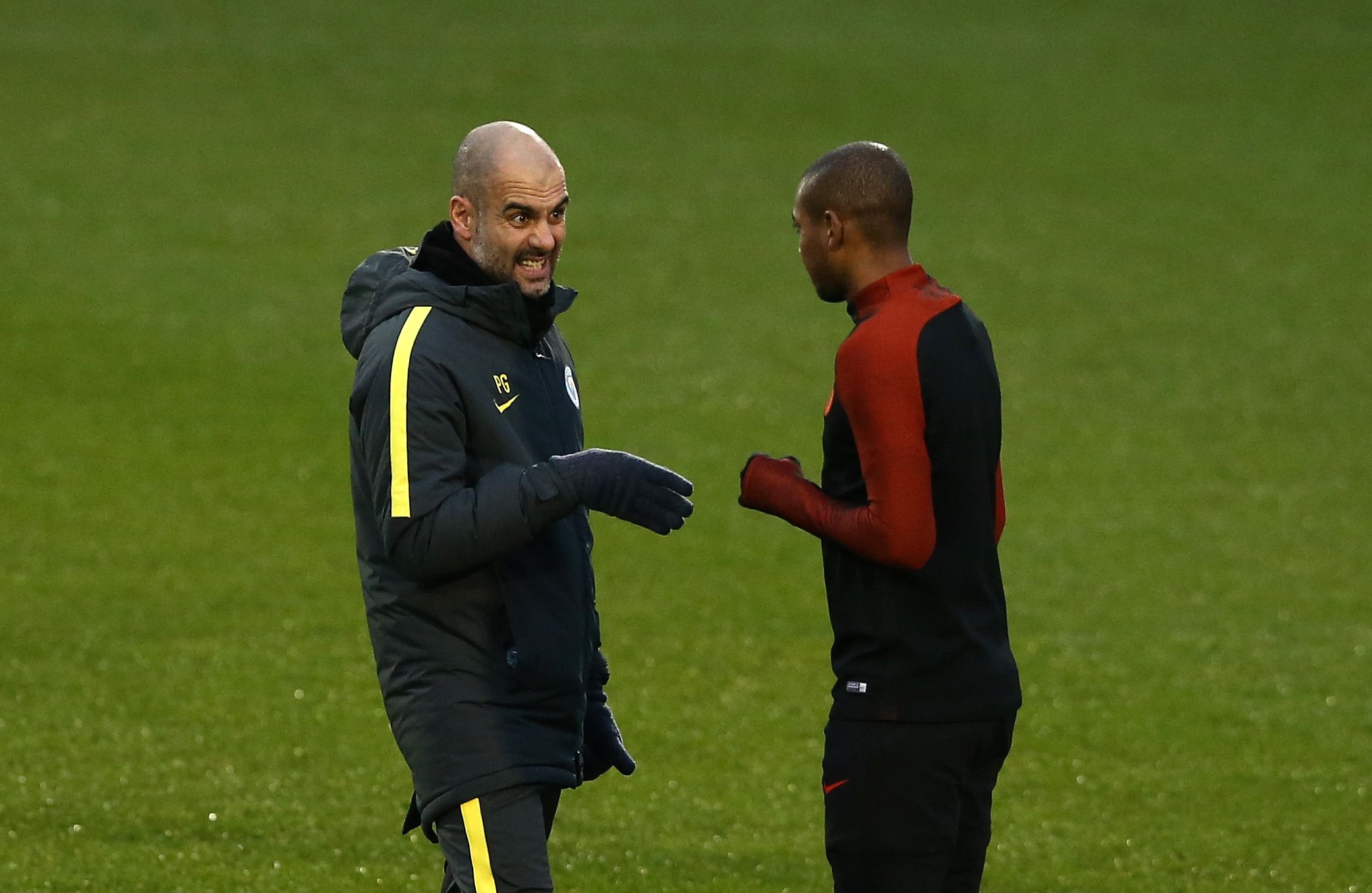 Manchester City manager Pep Guardiola, left.