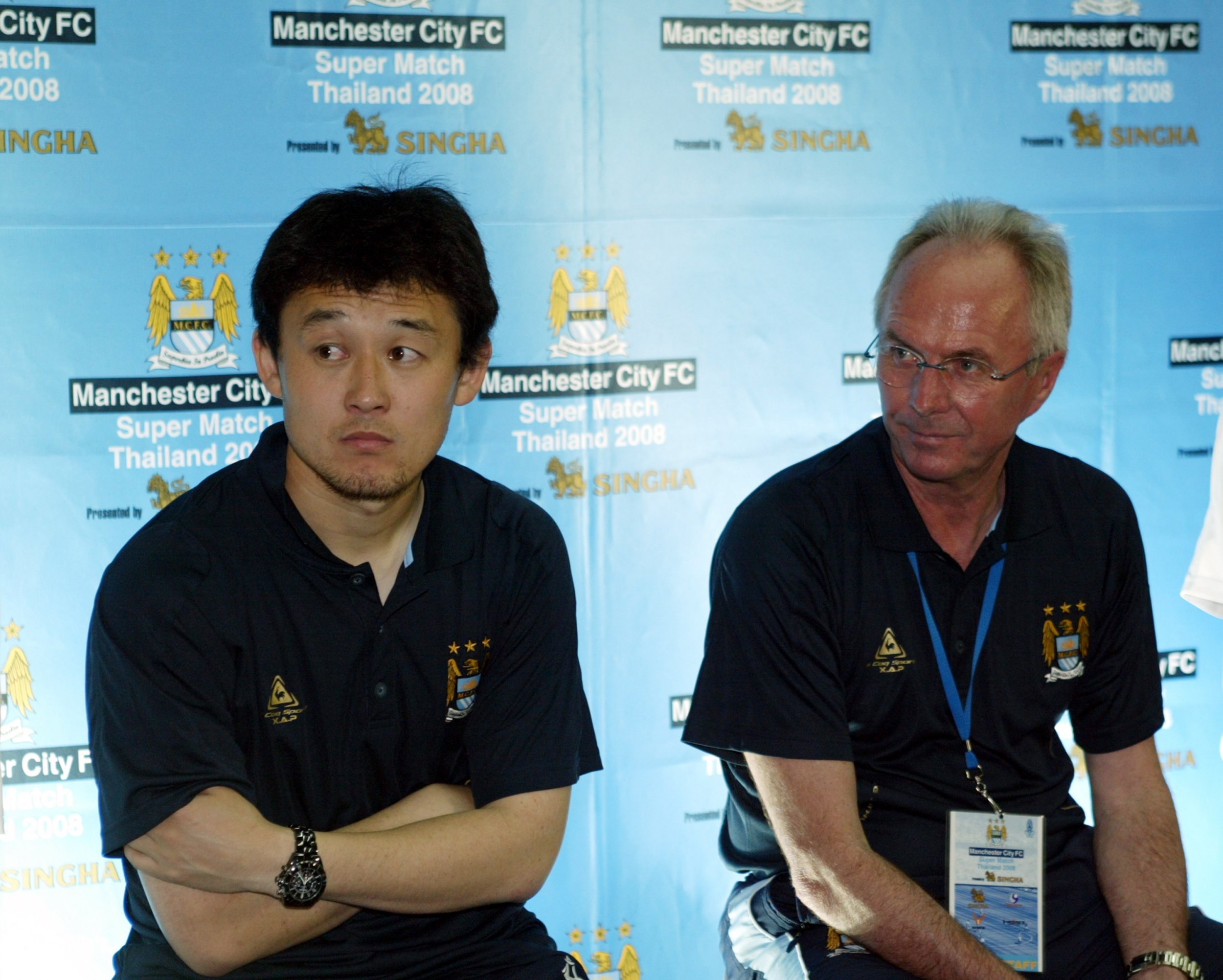 Former Manchester City defender Sun Jihai, left.