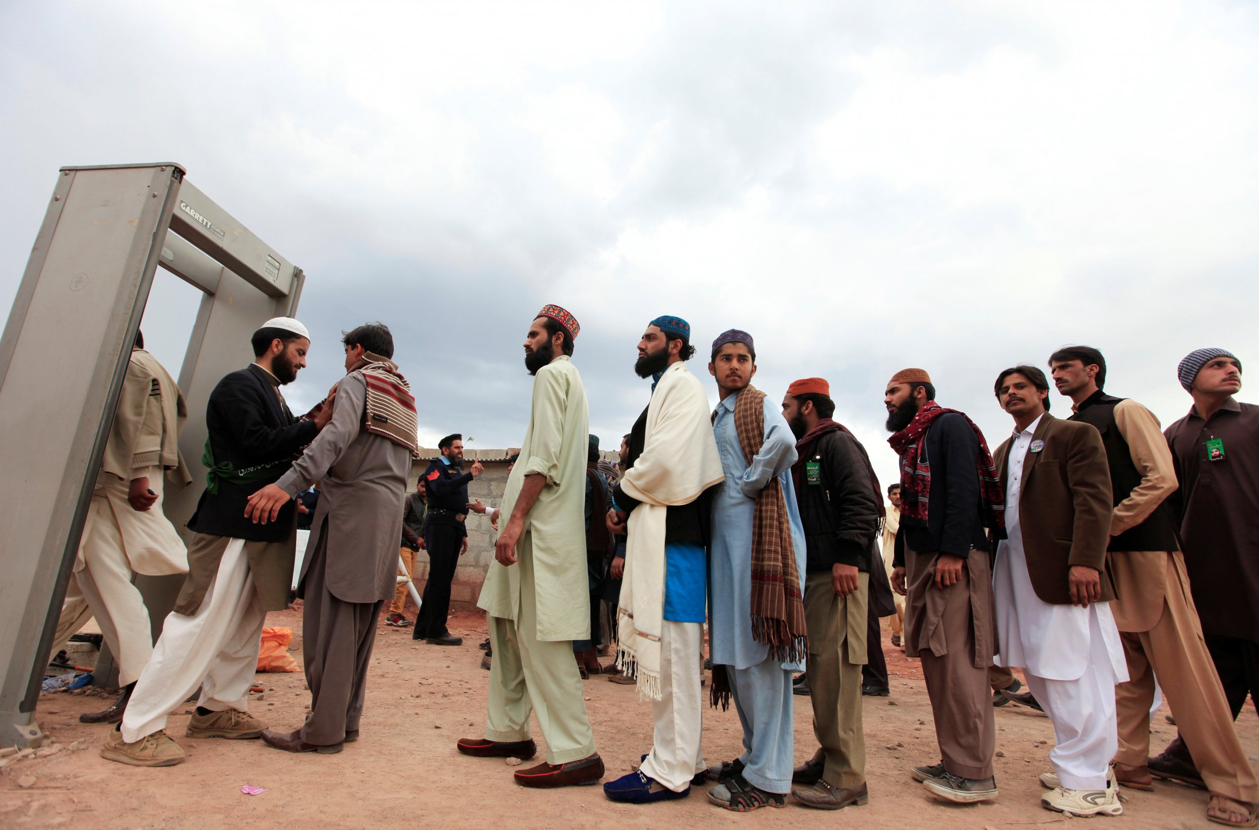 Men queue to access Qadri shrine