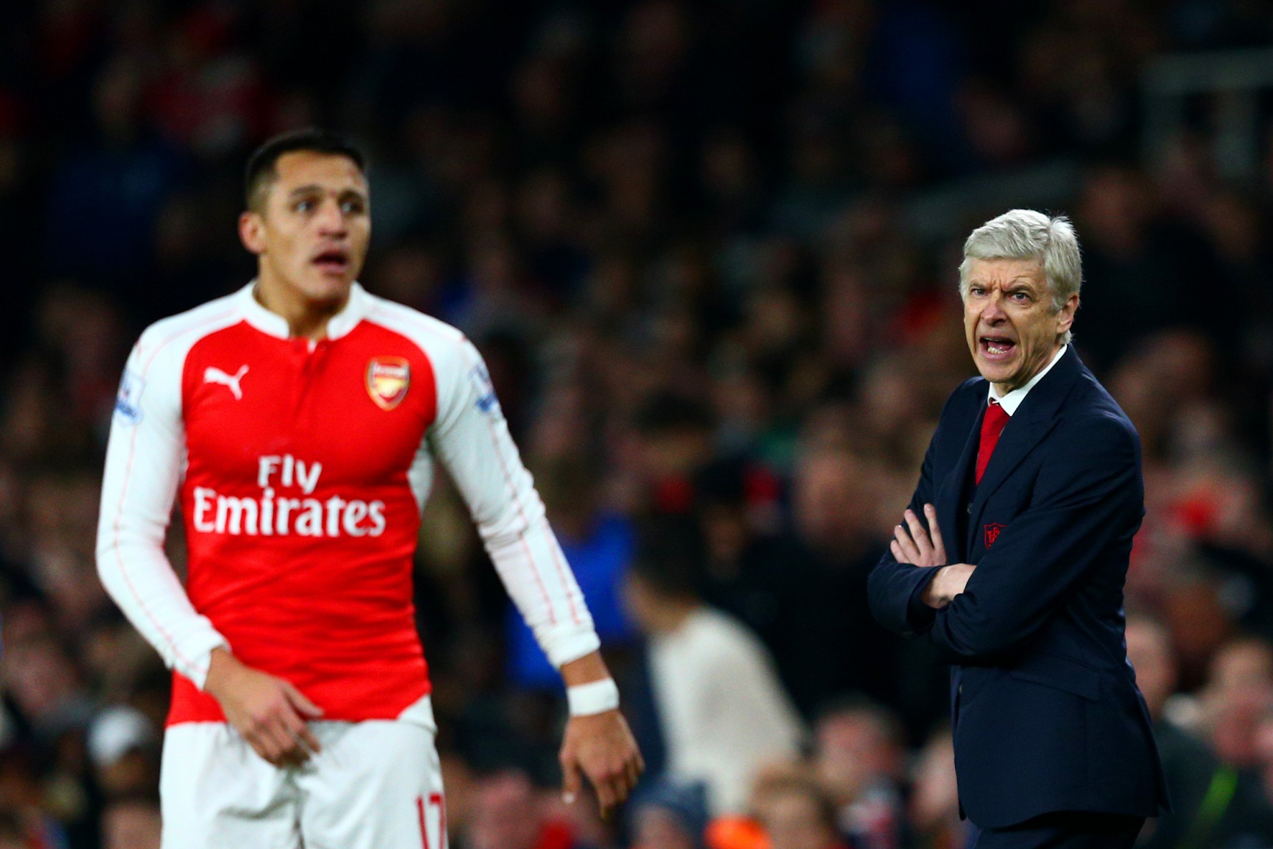 Alexis Sanchez, left, with Arsenal manager Arsene Wenger.