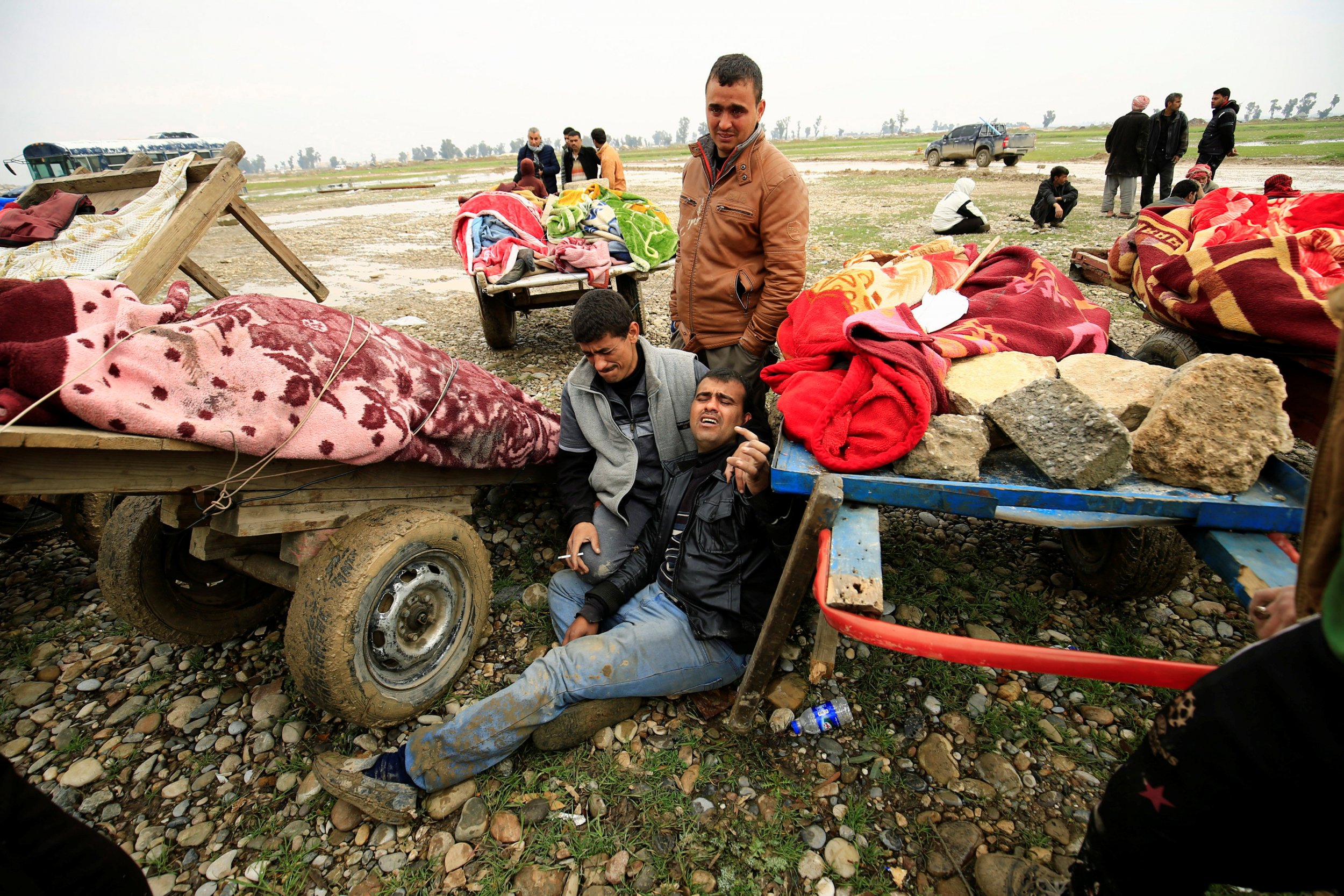 Mosul civilians near bodies