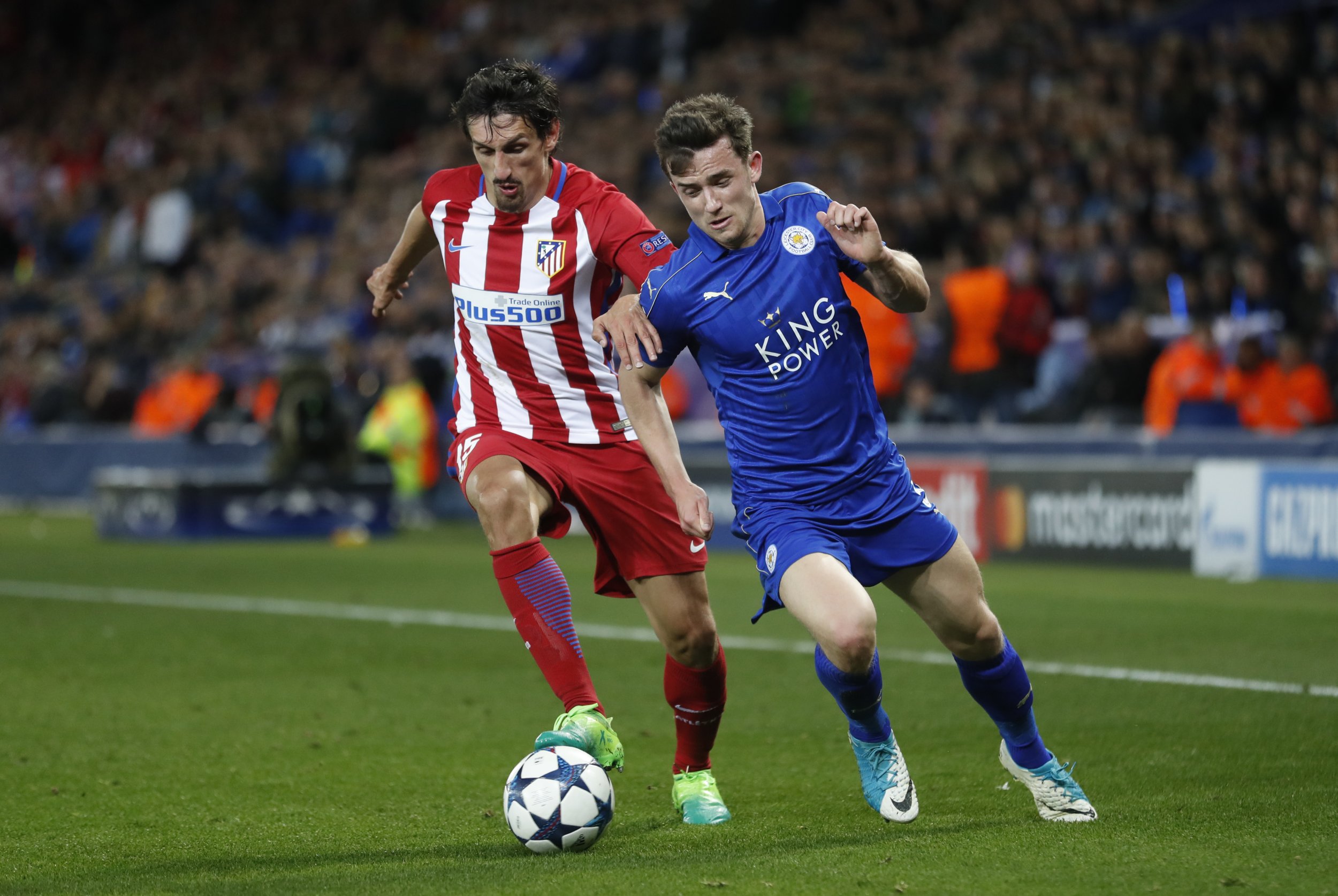 Atletico Madrid's Stefan Savic, left, with Leicester City's Ben Chilwell at King Power Stadium, Leicester, April 18.