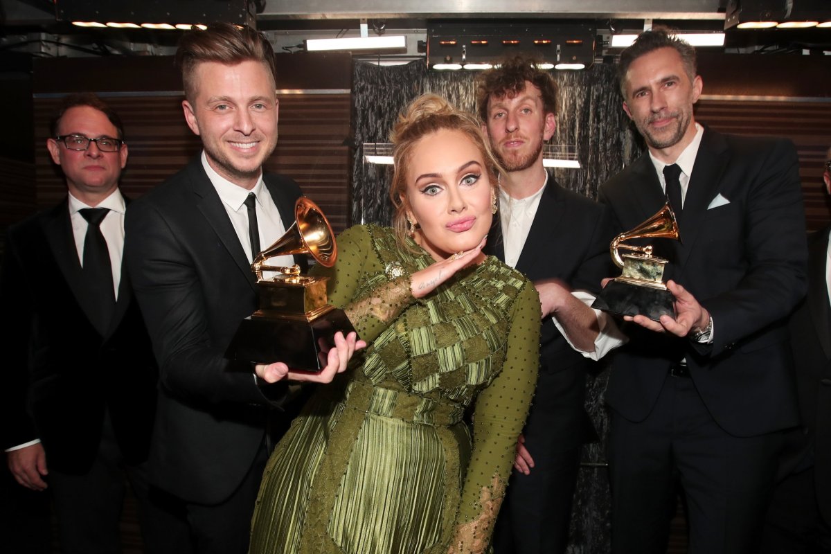 Adele and Ryan Tedder celebrate Grammy win