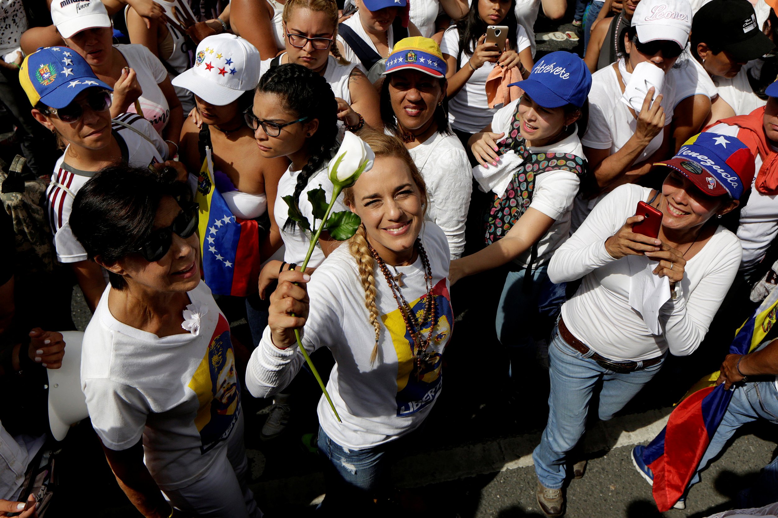 Venezuelan Women Protesters Face Opposition With Roses 