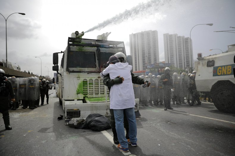 Venezuela doctor embraces soldier