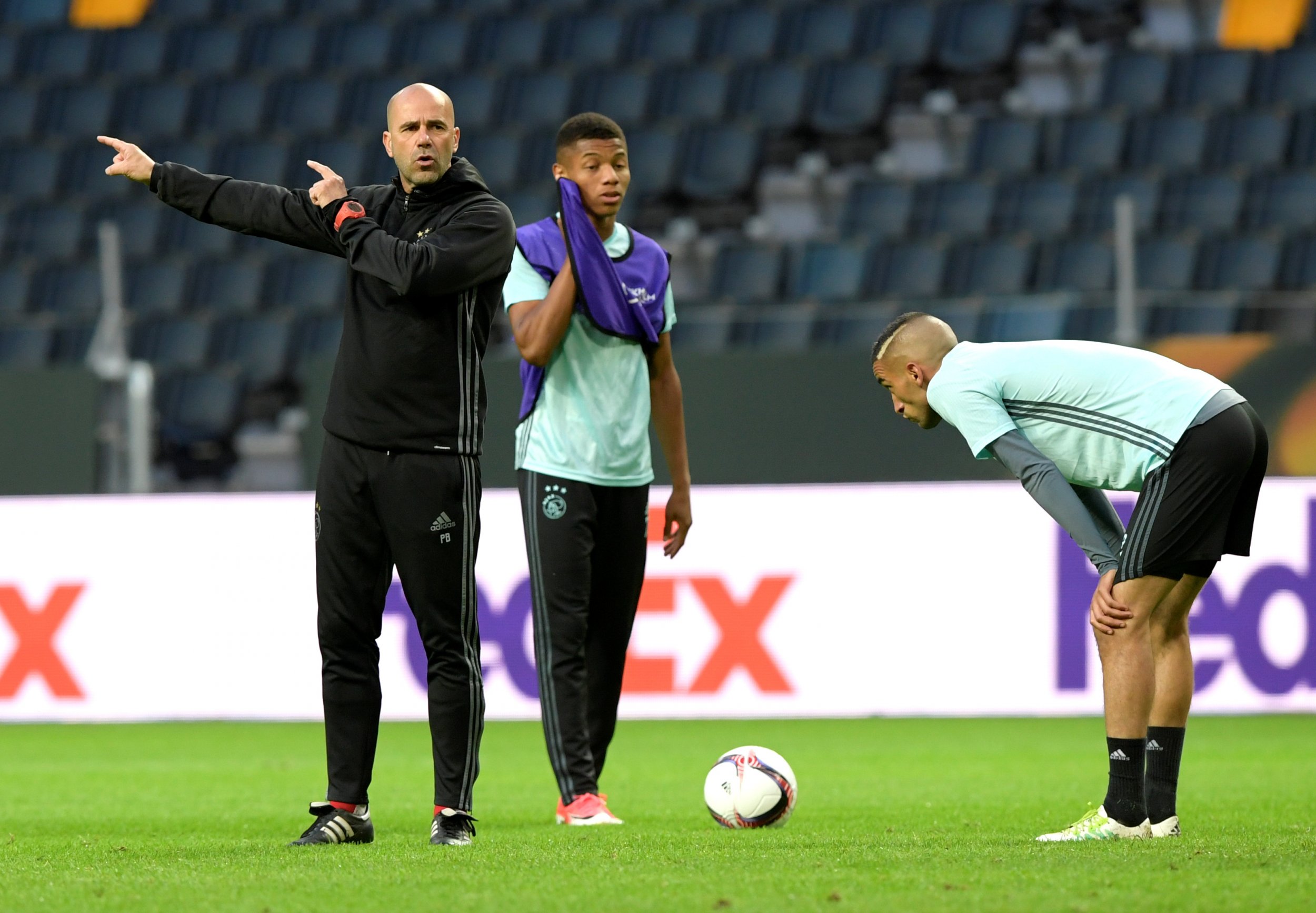 Ajax coach Peter Bosz, left.