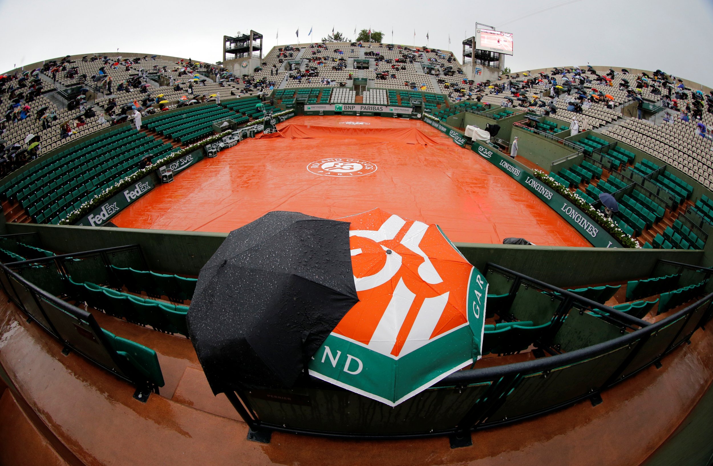 Roland Garros Stadium - Heavy downpour at French Open revives impulse