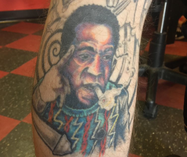 WATCH Rob McElhenney Shows Off Bill Cosby Tattoo on Conan  Ticket