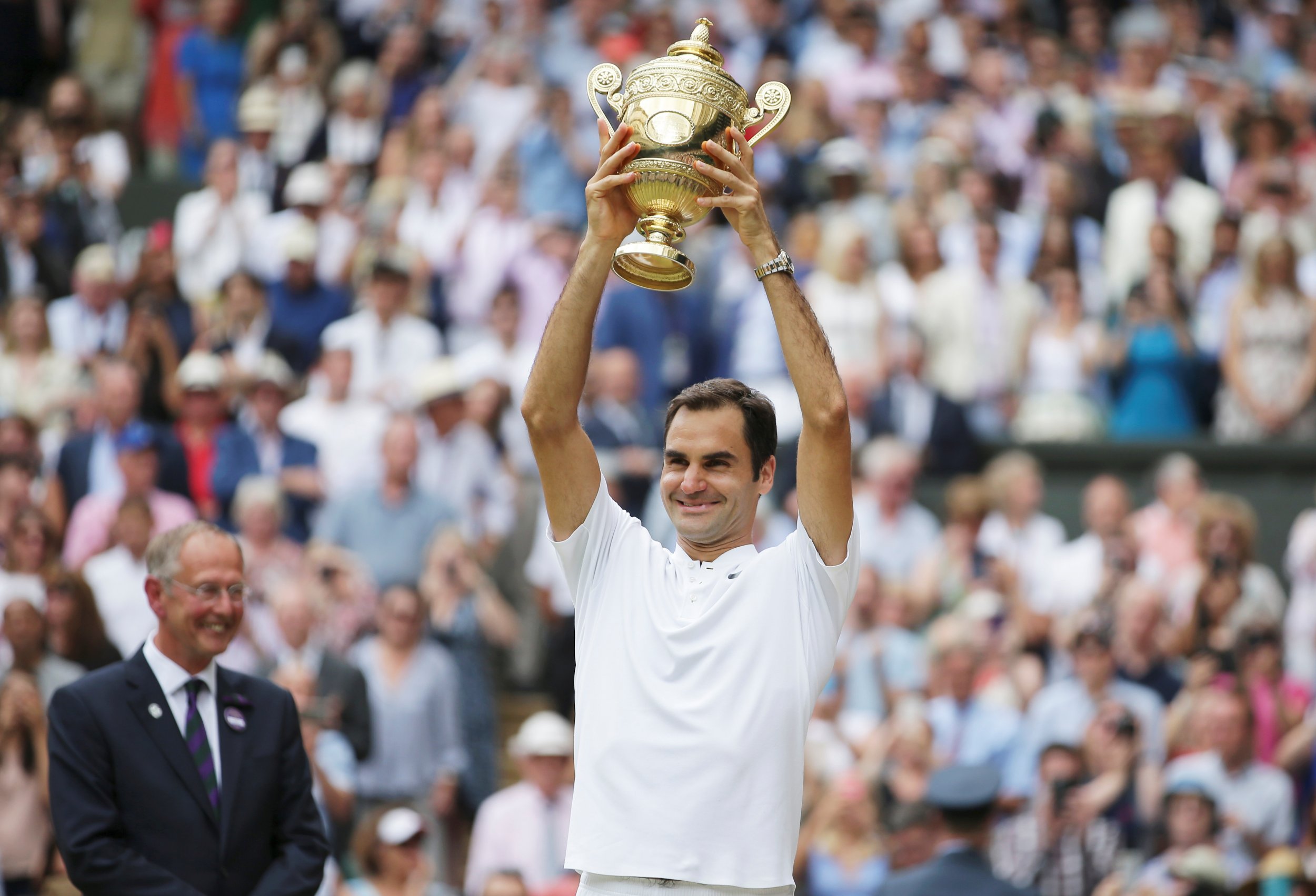 Roger Federer Wins A Record Breaking Eighth Wimbledon Title