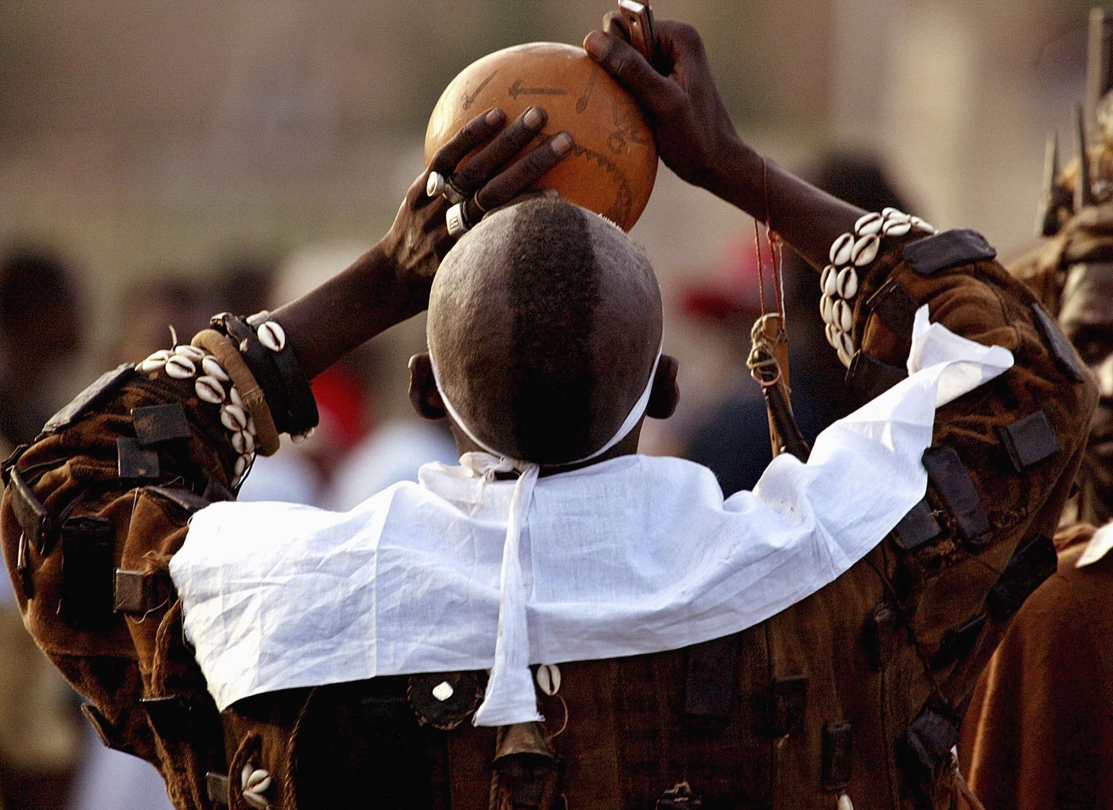 Traditional healer drinks animal blood