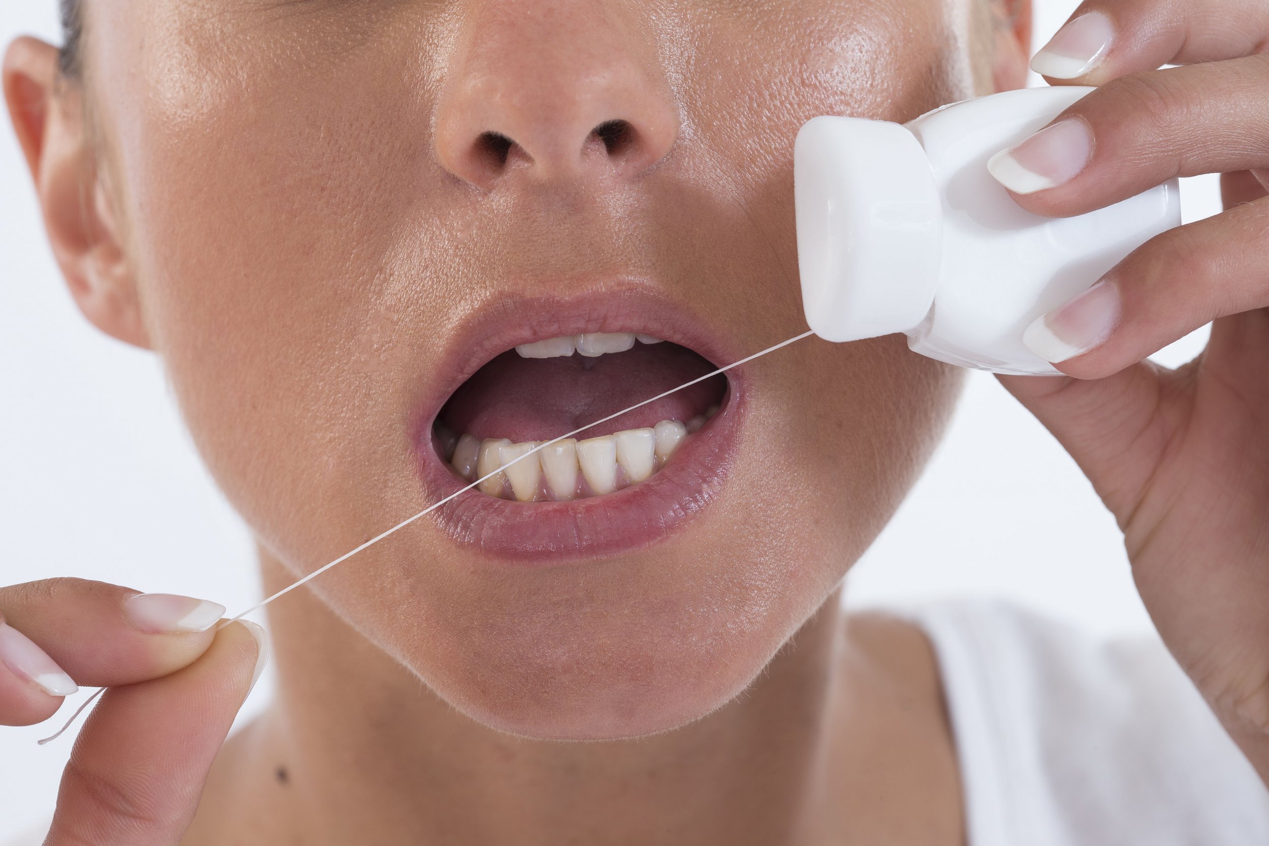 Americans Are Gross: in Ten Use Their Hair to Floss Their Teeth