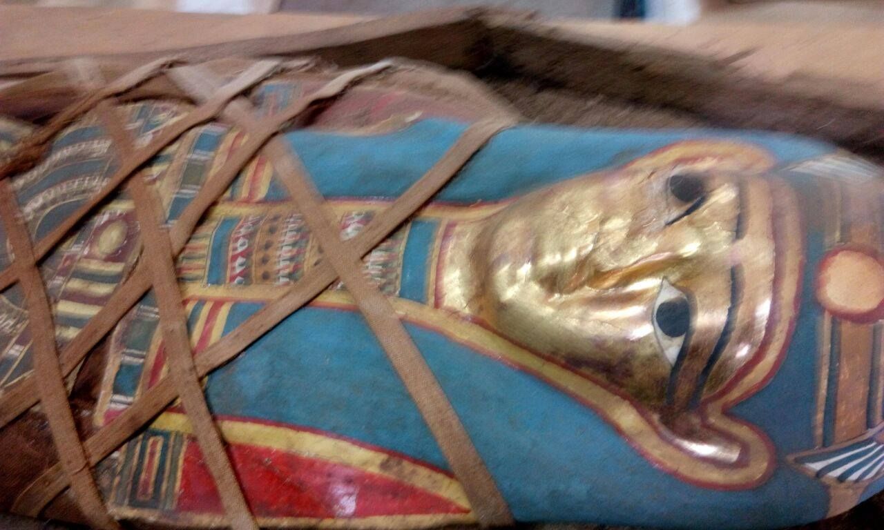 gold mask of egyptian mummy tuc