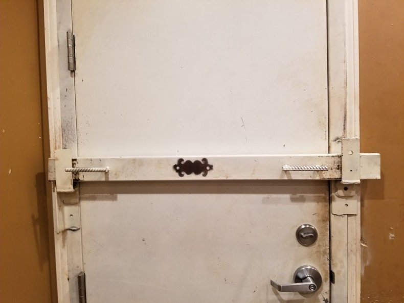 John Mcafee bedroom door security