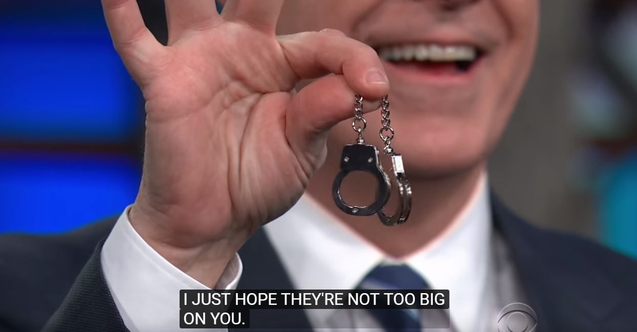 Donald Trump Possibly Obstructed Justice, So Stephen Colbert Bought Him a  Pair of Tiny Handcuffs