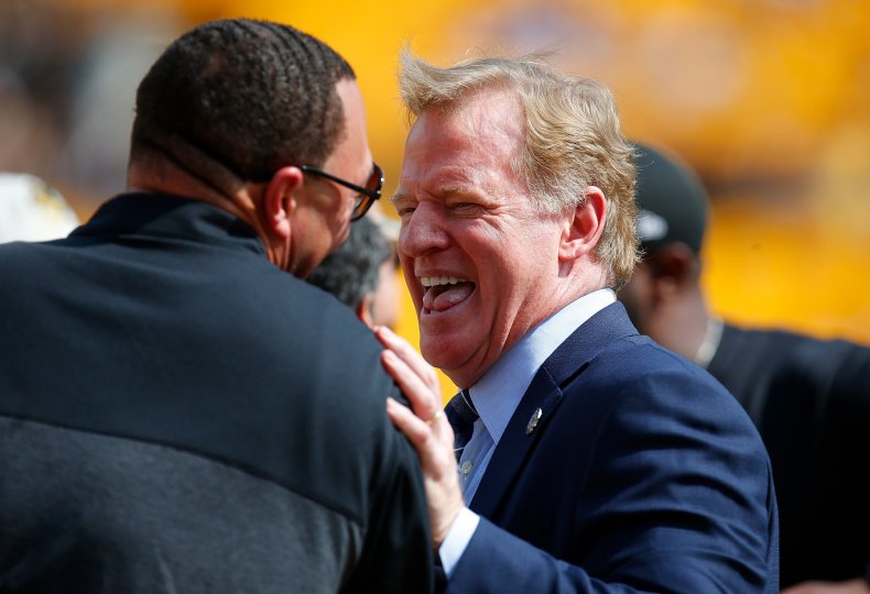 NFL Commissioner Roger Goodell shares a laugh with former Pittsburgh Steelers quarterback Charlie Batch at Heinz Field, Pittsburgh, September 17.