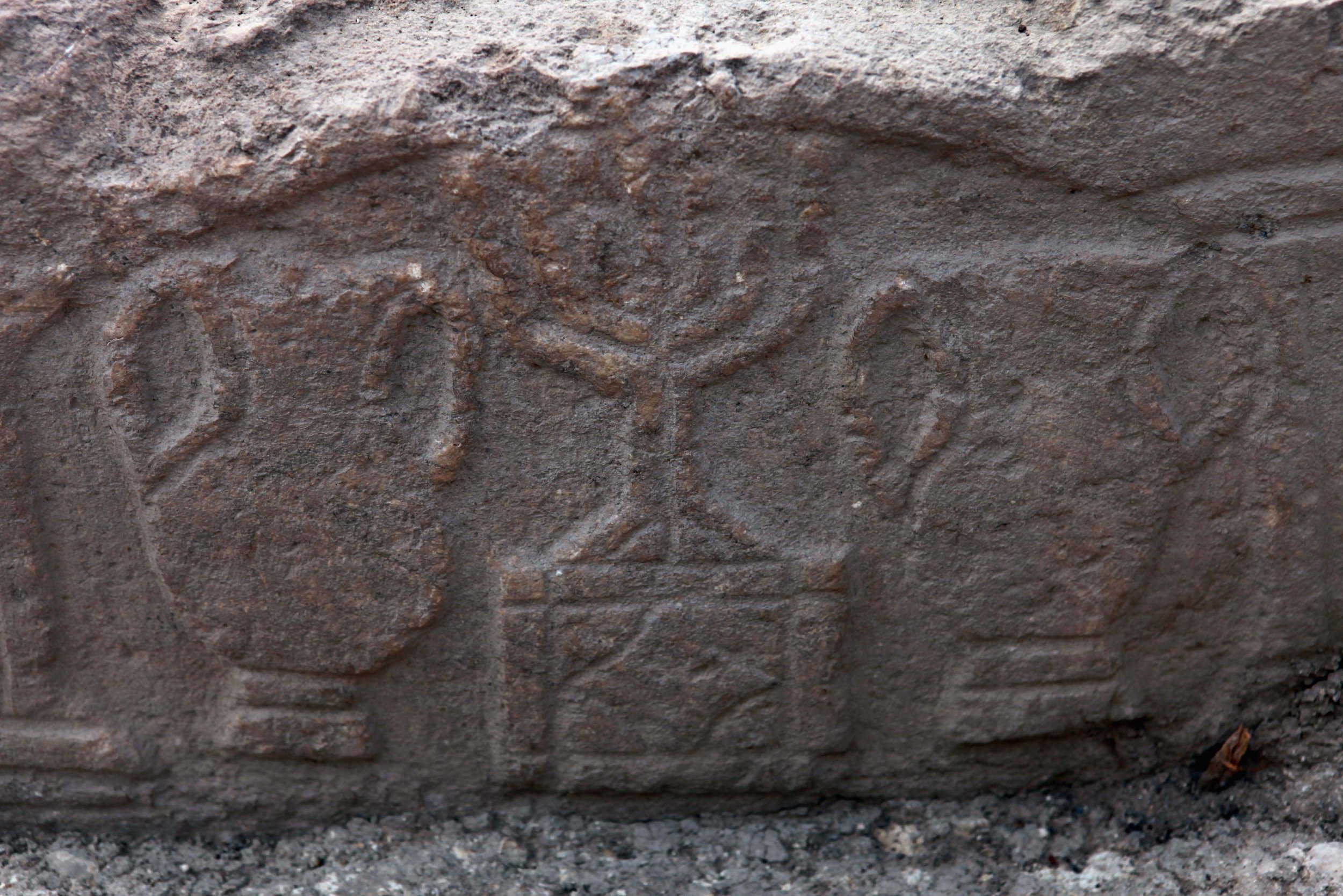 Ancient menorah stamp used to mark kosher bread unearthed