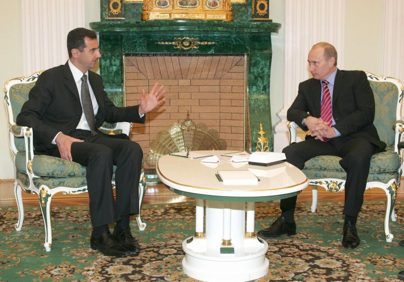 12_21_Putin_Assad