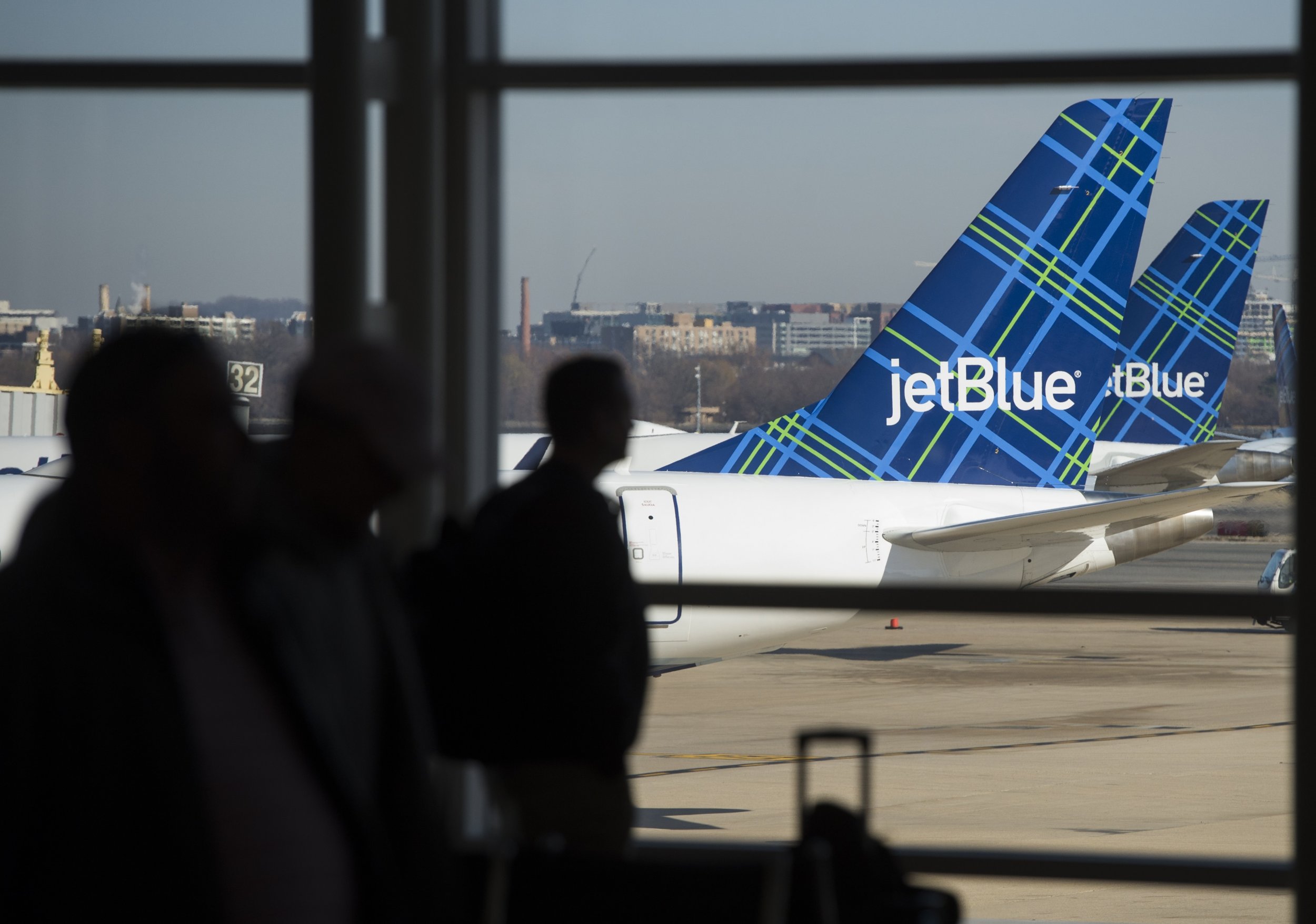 JetBlue Plane Slides Off Icy Runway at Boston Airport After Flying