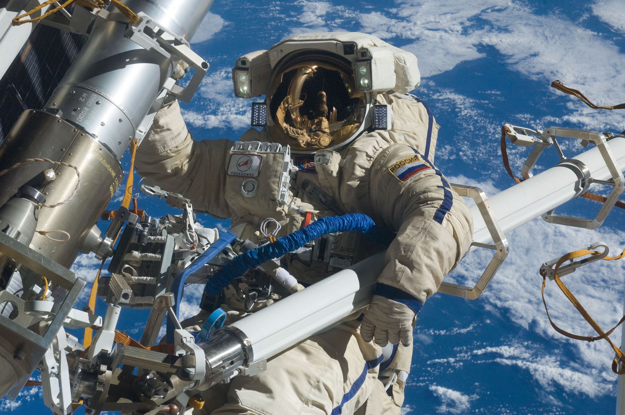 astronauts-spacewalking-outside-space-station-install-antenna-the-wrong-way