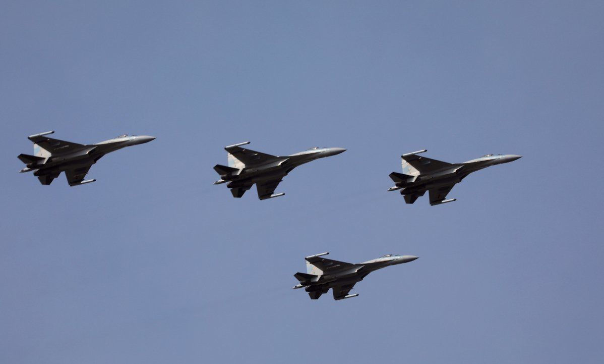 China Reveals Its New Russian Jets Flying Over Secret Military Bases in