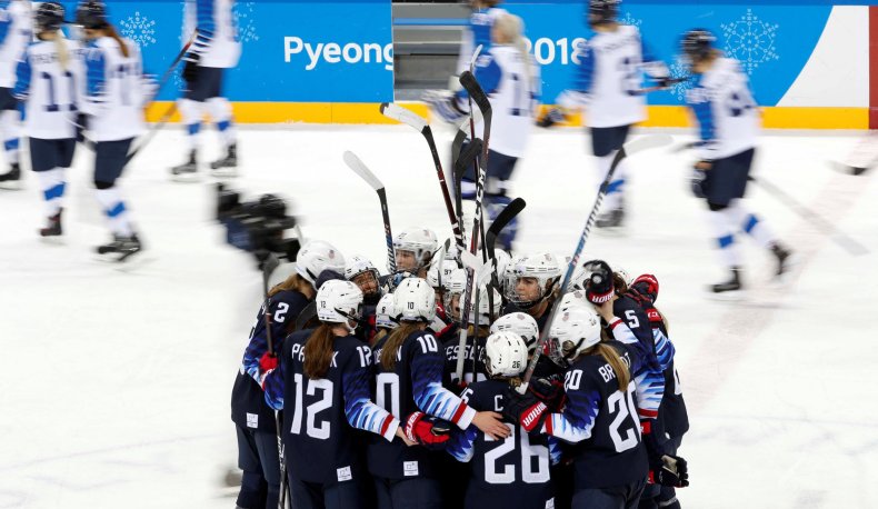 US women's ice hockey team celebrate victory over Finland