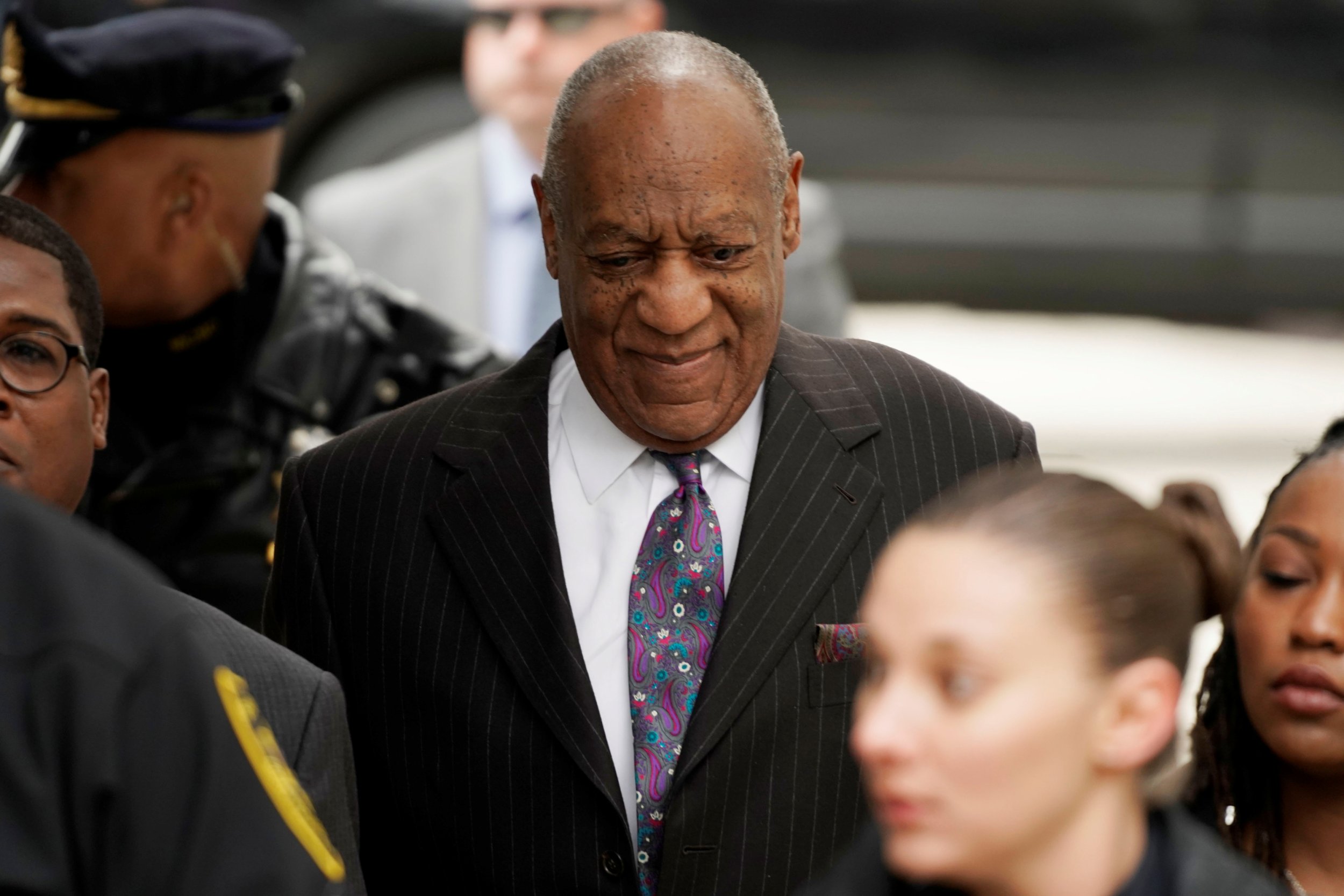 Topless Protester Charges At Bill Cosby Outside Courthouse Before Actor 