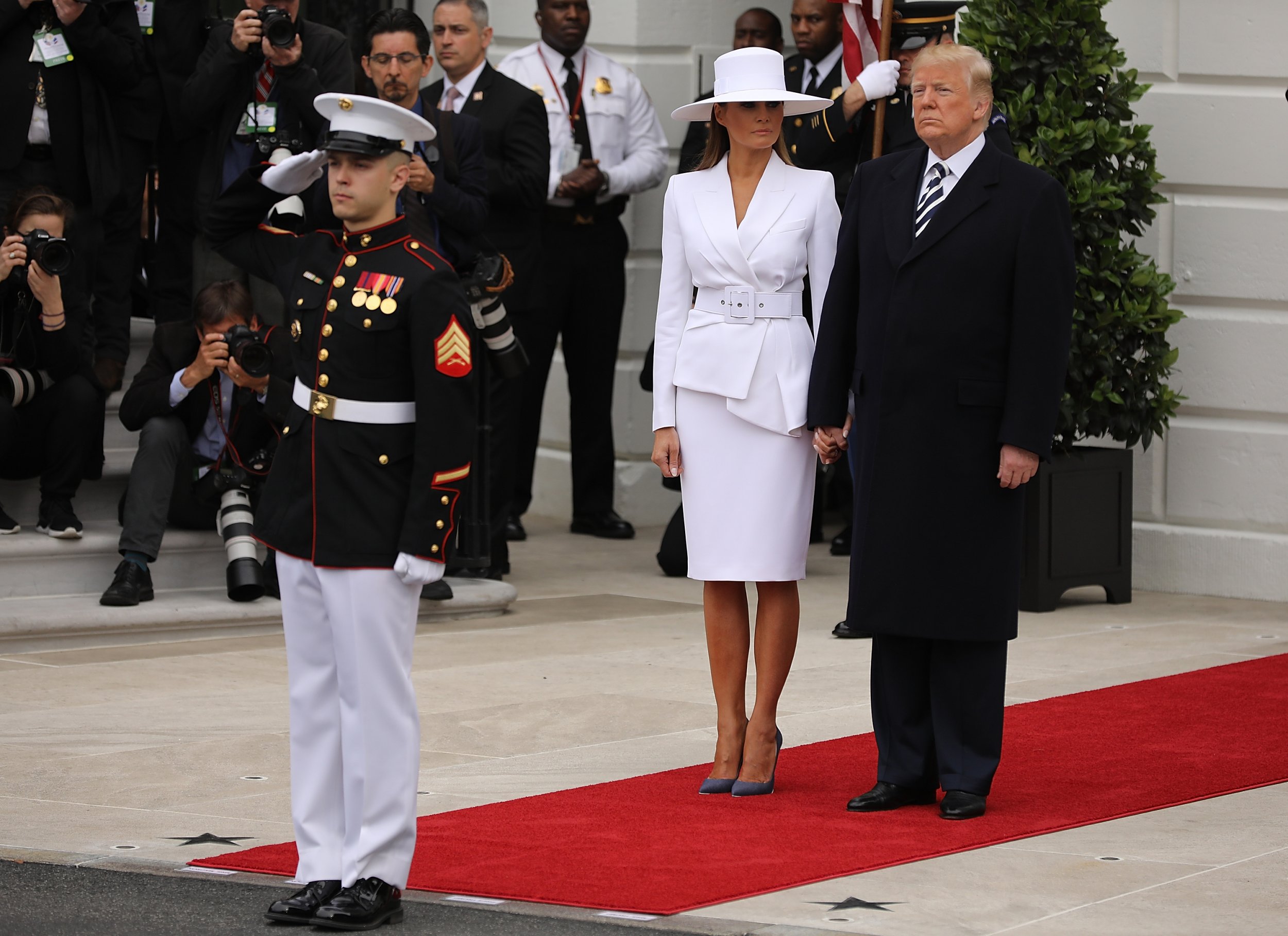 Watch: Donald Trump Struggles to Get Melania to Hold His Hand During