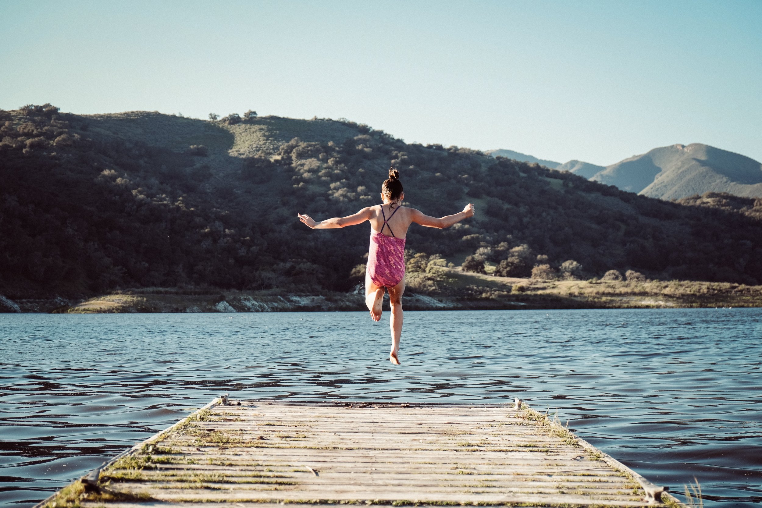 woman-jumping-stock woman-jumping-stock