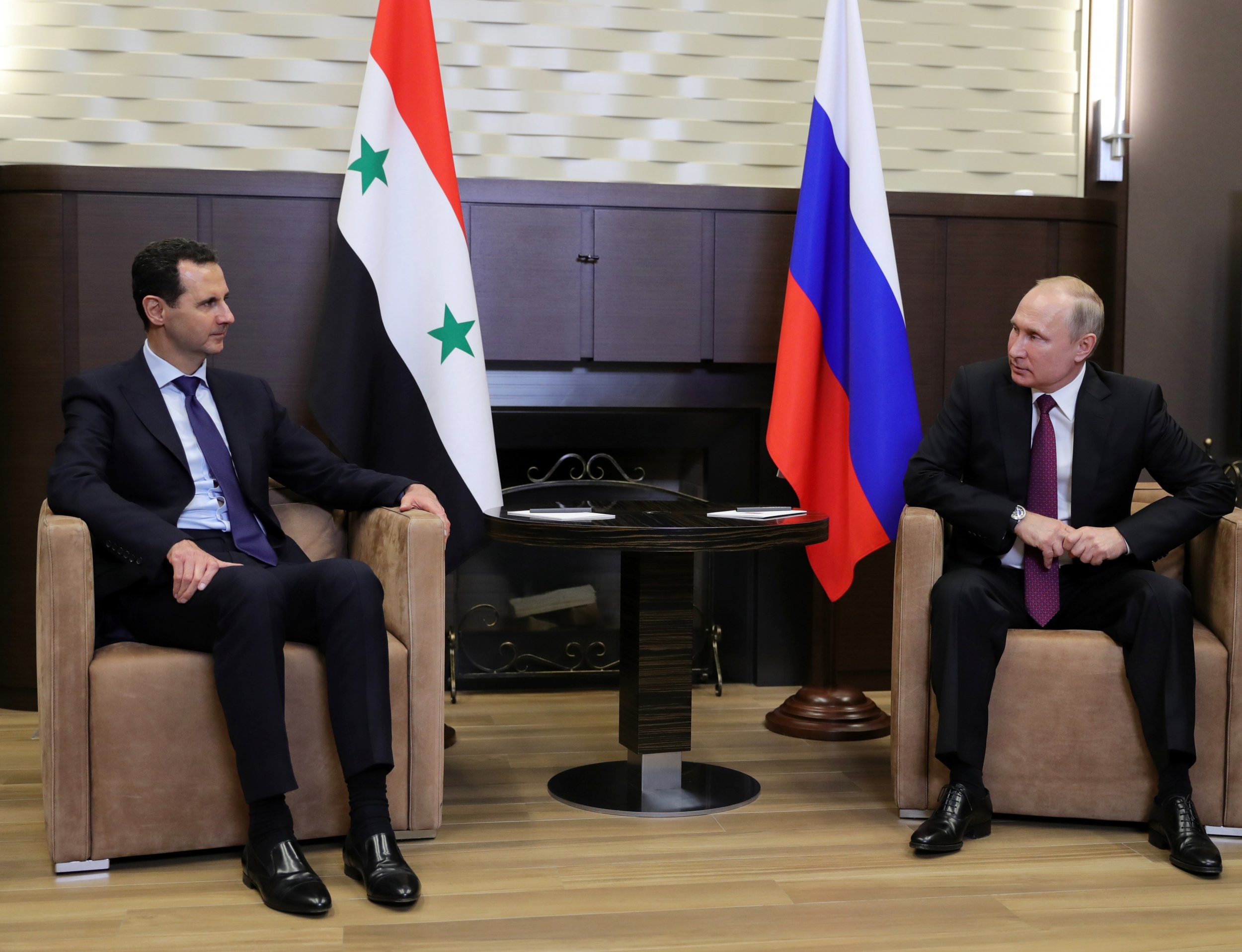 Syria's Assad Meets Putin In Russia, Says He Wants 'Political Process ...