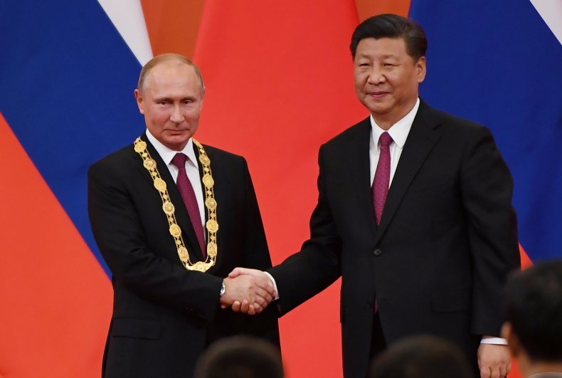 2018-06-08T125722Z_1_LYNXNPEE5711E_RTROPTP_4_CHINA-RUSSIA