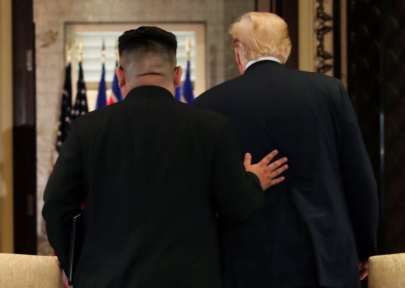 06_12_Kim_Hand_Trump