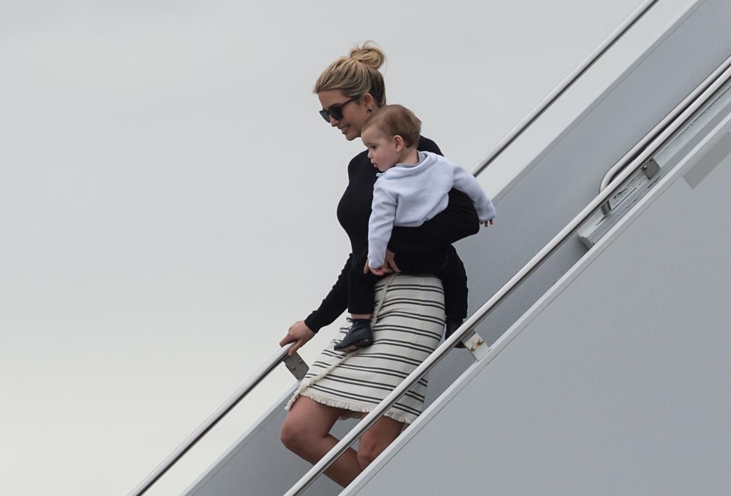Ivanka Trump steps off Air Force One with her son Theodore upon arrival in West Palm Beach, Florida, on March 3, 2017. 