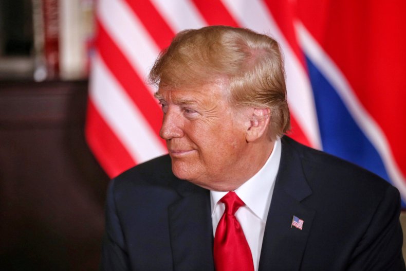 2018-06-12T103917Z_769765556_RC155FE60E80_RTRMADP_3_NORTHKOREA-USA
