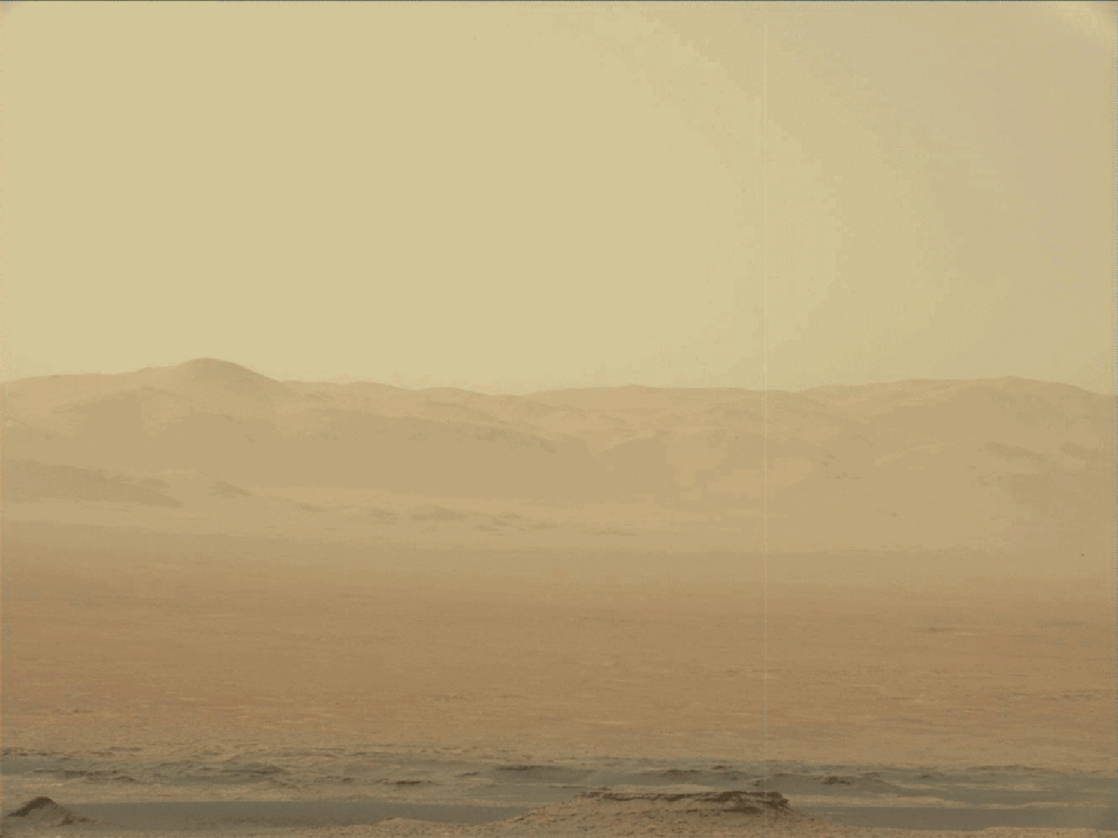 Exploring Mars' Red Hue: Geological & Atmospheric Factors